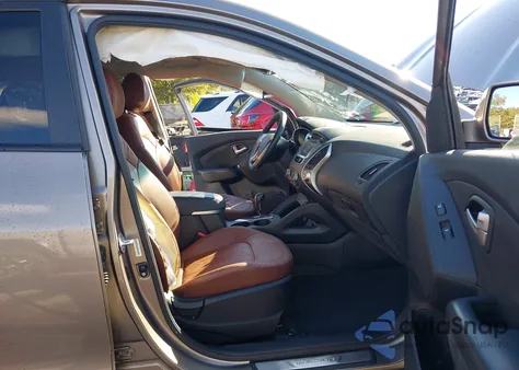 2013 Hyundai Tucson Limited z USA, uszkodzony, nr VIN KM8JUCAC2DU605795